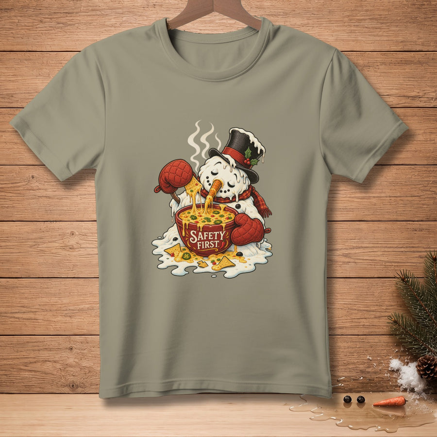 Melting snowman with hat, scarf, and oven mitts eating nachos from a bowl labeled "SAFETY FIRST."