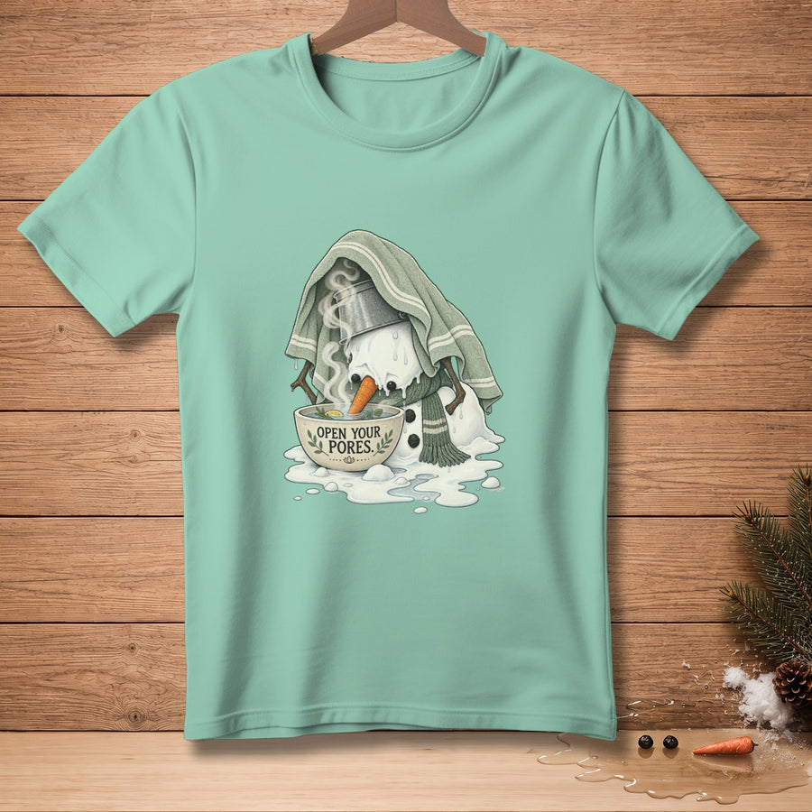Melting snowman with steam and "Open Your Pores" text on a teal t-shirt.