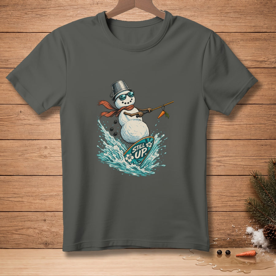 Snowman surfing with carrot on a surfboard that says "Still Up".
