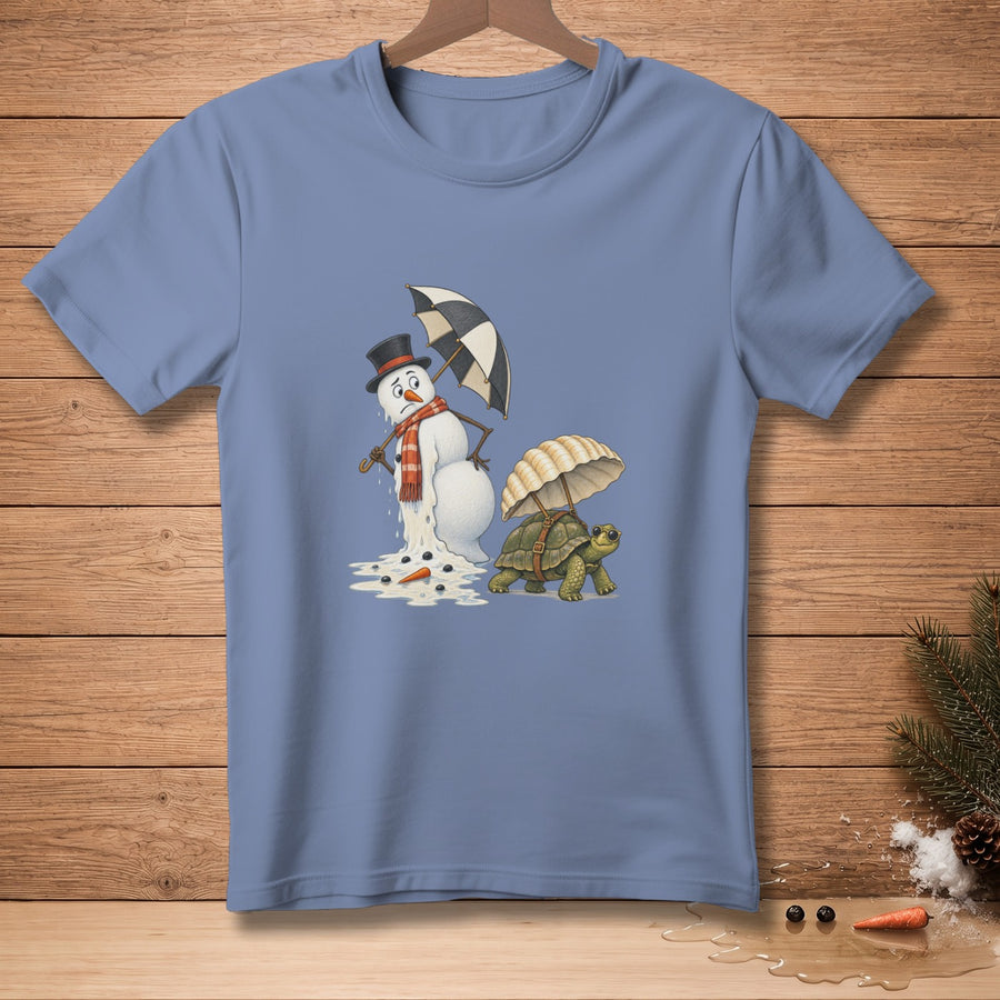 Melting snowman with umbrella beside turtle with umbrella and carrot.
