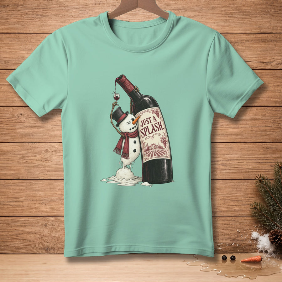 Melting snowman with wine bottle wearing a hat and scarf, text "JUST A SPLASH."