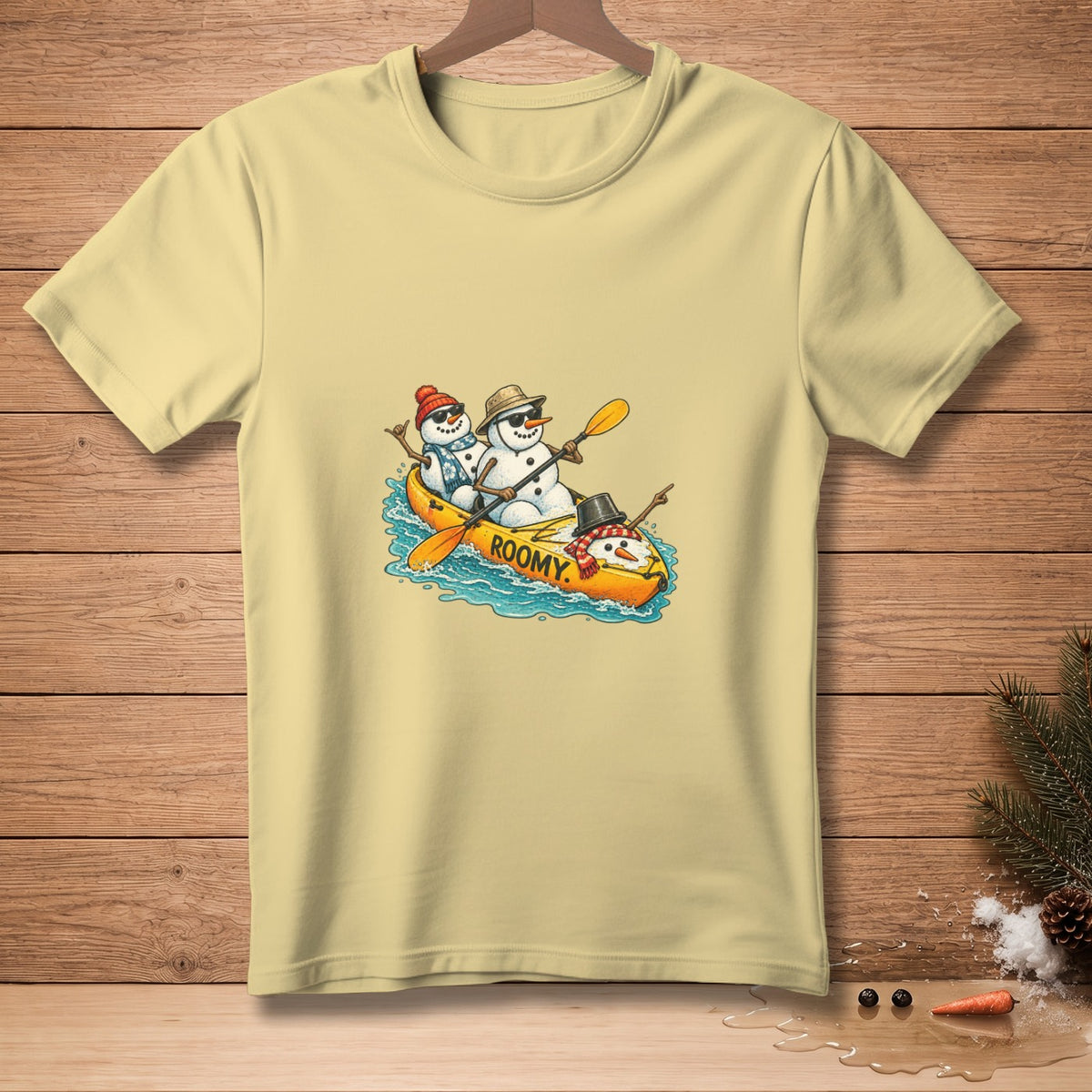 Three snowmen in a yellow kayak with "ROOMY" text, wearing hats and sunglasses.