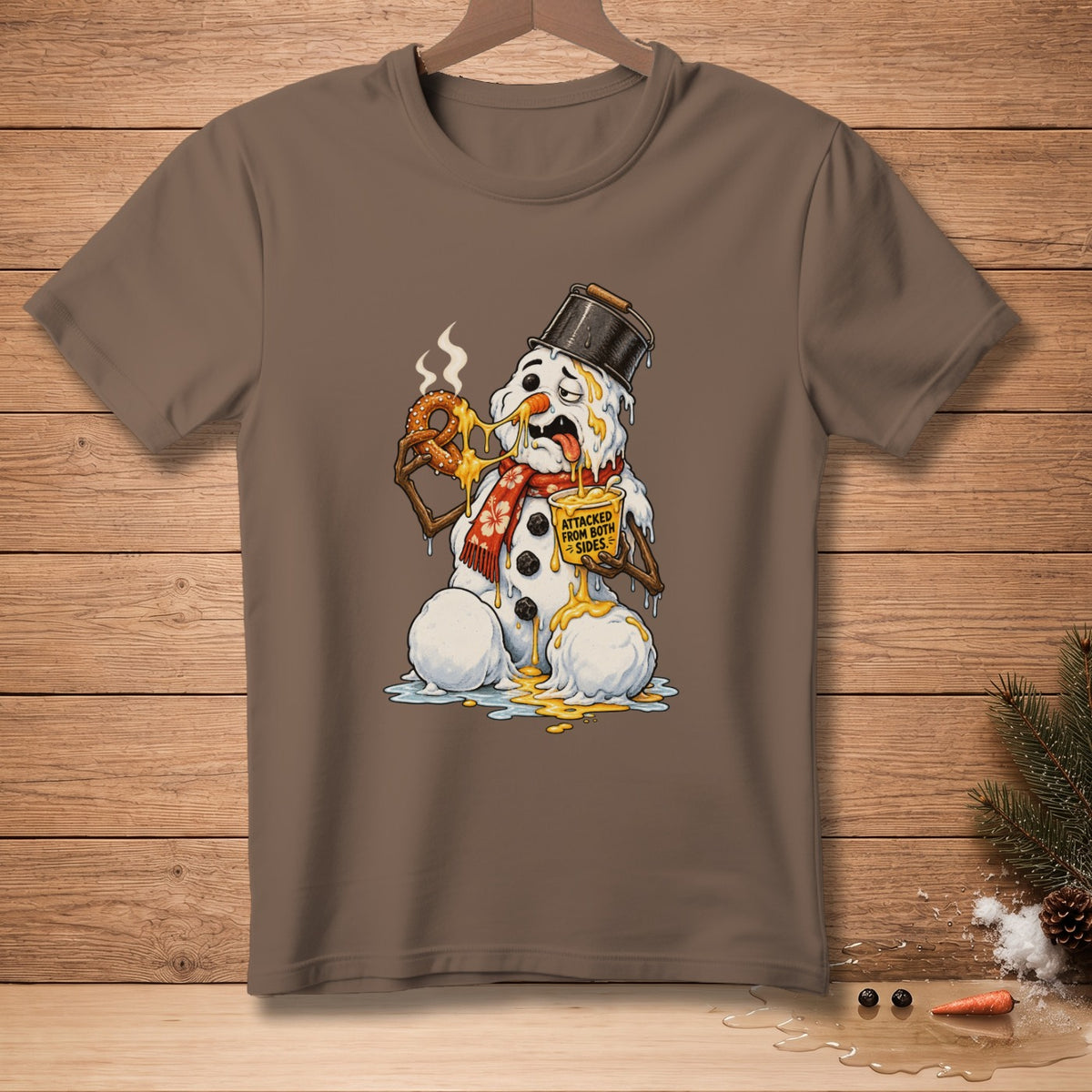 Melting snowman with pretzel and yellow cup reading "attacked from both sides."