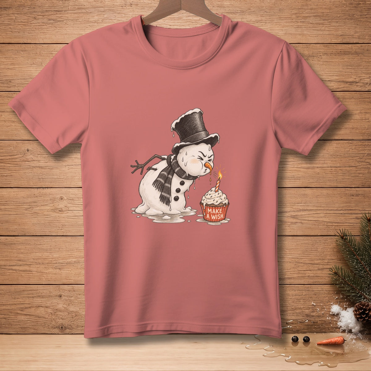Melting snowman in a top hat blowing out candle on cupcake with "Make a Wish" text.