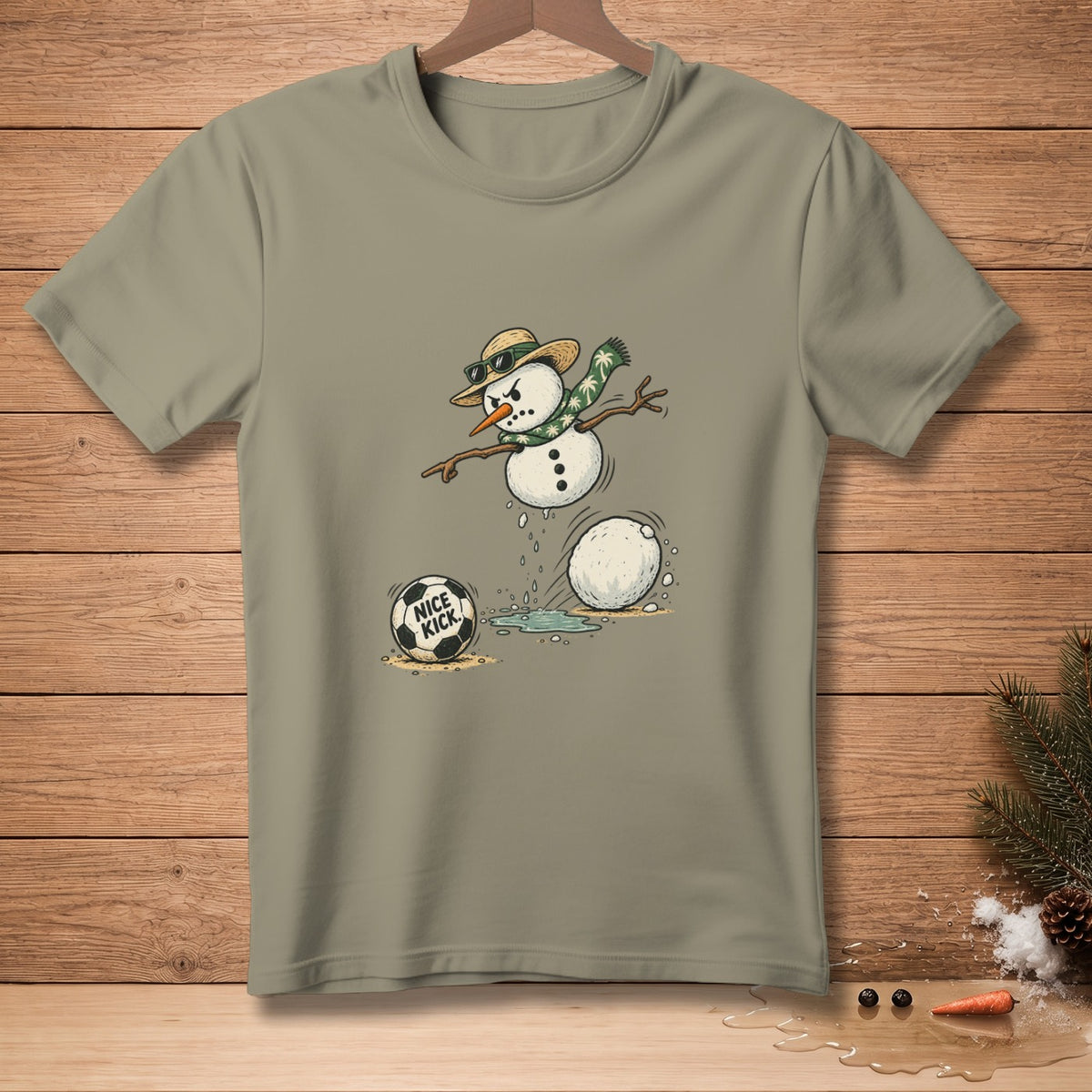 Snowman wearing sunglasses and scarf kicking soccer ball with "NICE KICK" text.