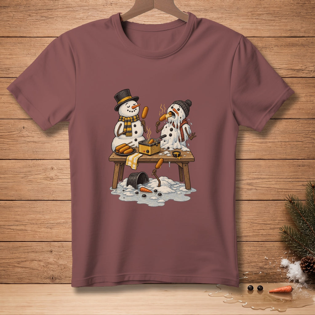 Two snowmen on a table, one cooking corn dogs while the other melts.