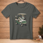Two snowmen in sunglasses ride in a golf cart with golf clubs.