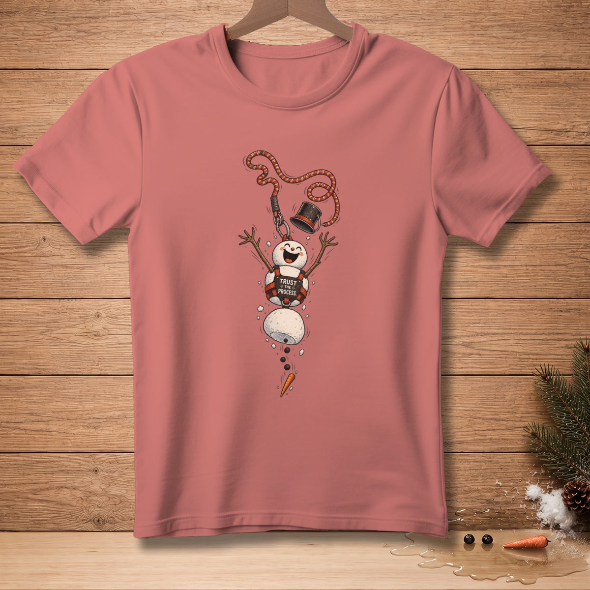 T-shirt with a melting snowman graphic that says "Trust the Process."