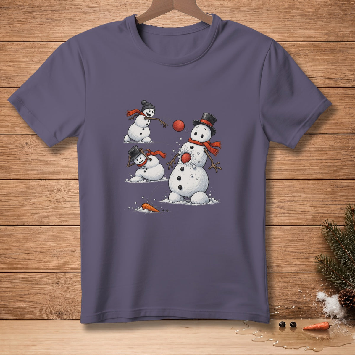 Cartoon snowmen playing with snowballs and a carrot on a purple t-shirt.