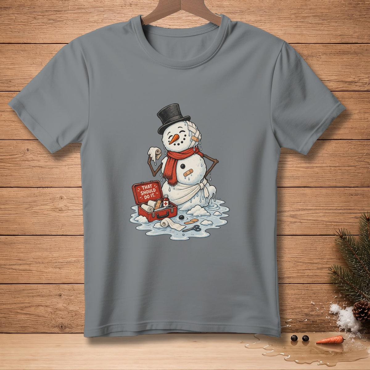 Melting snowman in top hat with first-aid kit and text "THAT SHOULD DO IT."