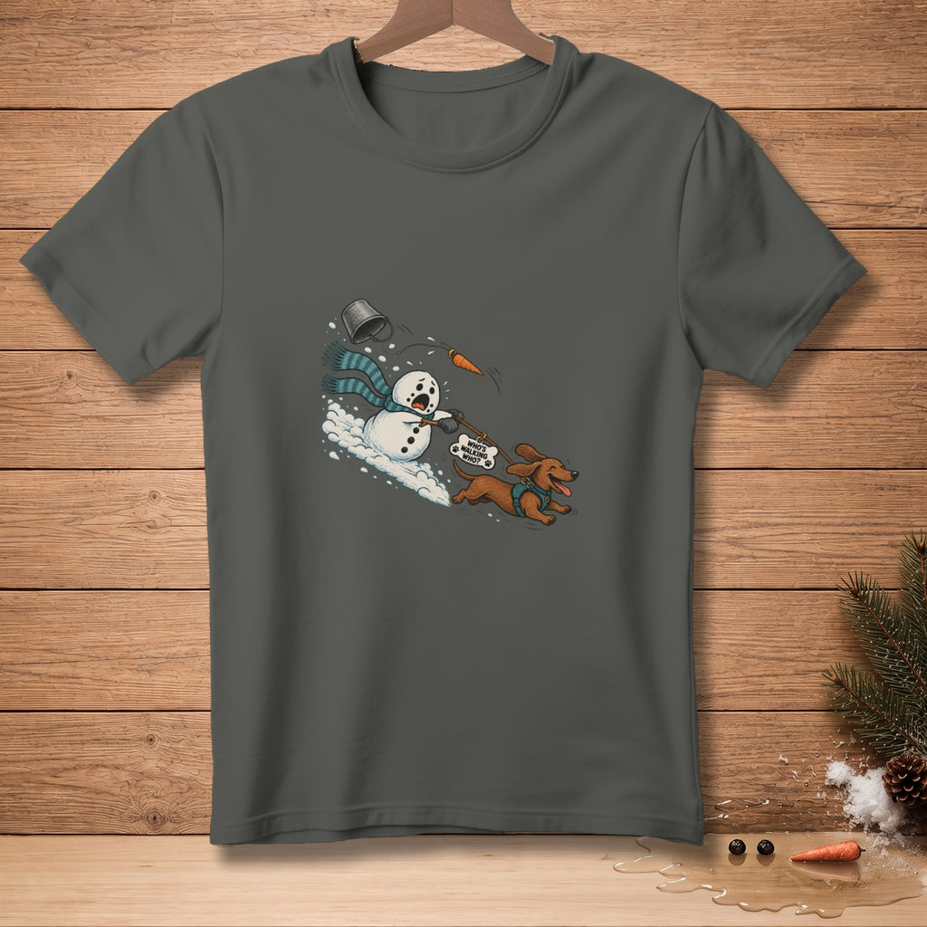 Dachshund pulling snowman with "Who's walking who?" tag.