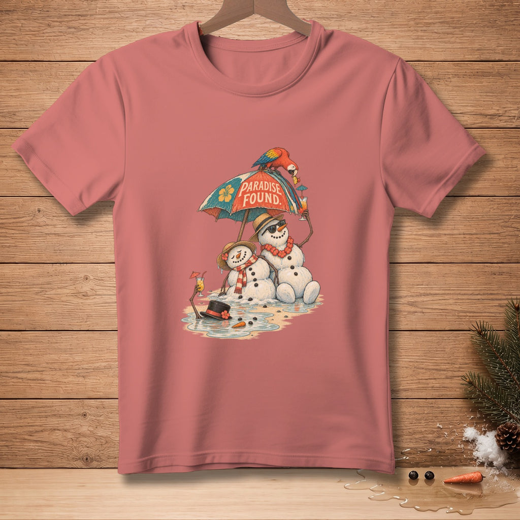 Two snowmen sit on a beach under an umbrella that reads "Paradise Found".
