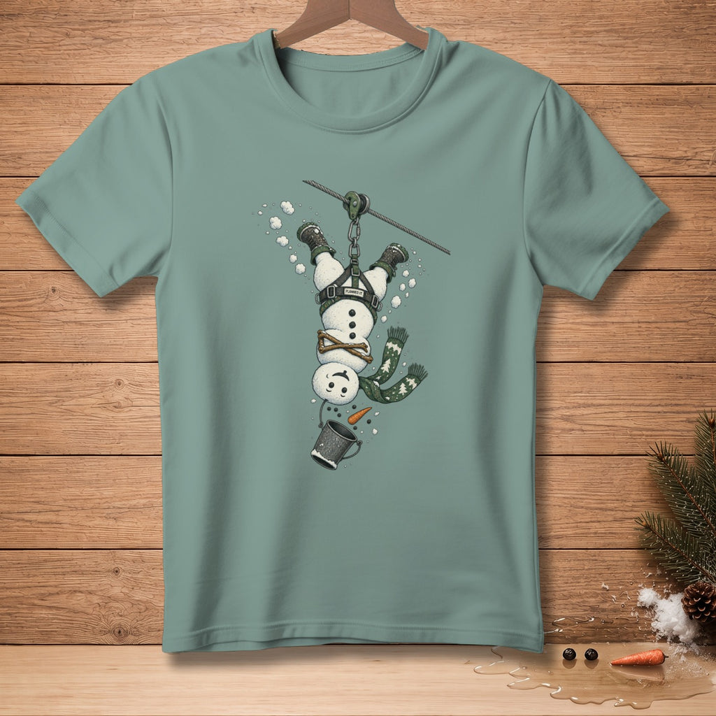 Green t-shirt with illustration of snowman ziplining upside down.