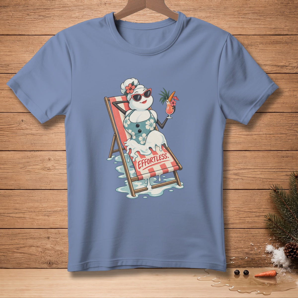Snowman in bikini lounging on a beach chair with cocktail, "Effortless" text.