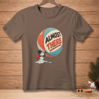 Brown t-shirt with a melting snowman and a beach ball with text "ALMOST THERE".
