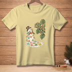 Snowman in a hat and lei melts, surrounded by tiny umbrellas, with a colorful chameleon on a branch.