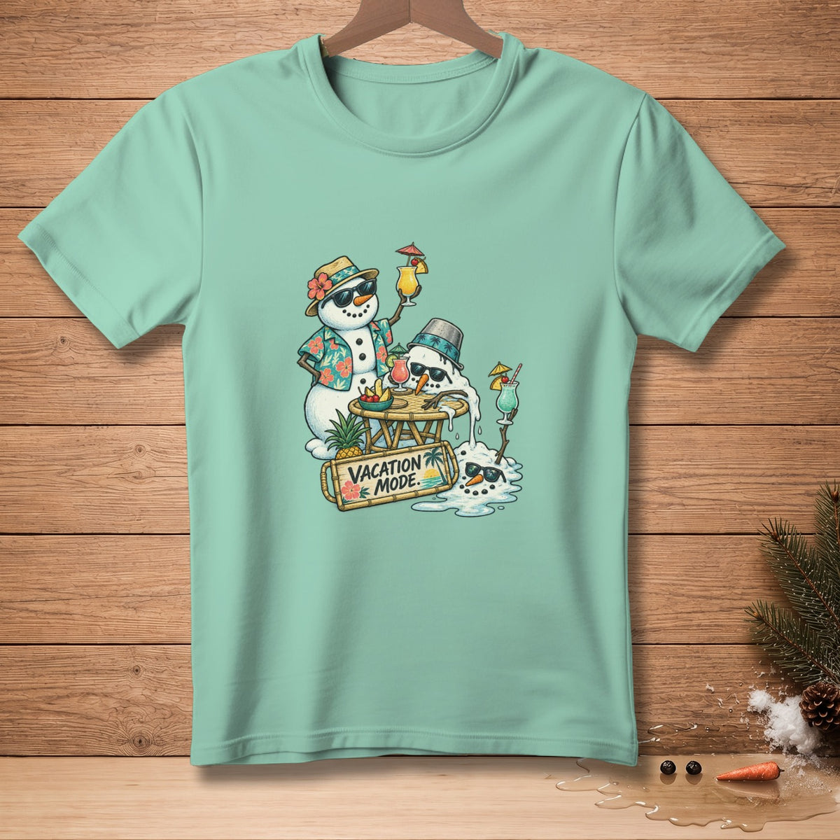T-shirt with cartoon snowmen enjoying cocktails, one melting, with "Vacation Mode" text.