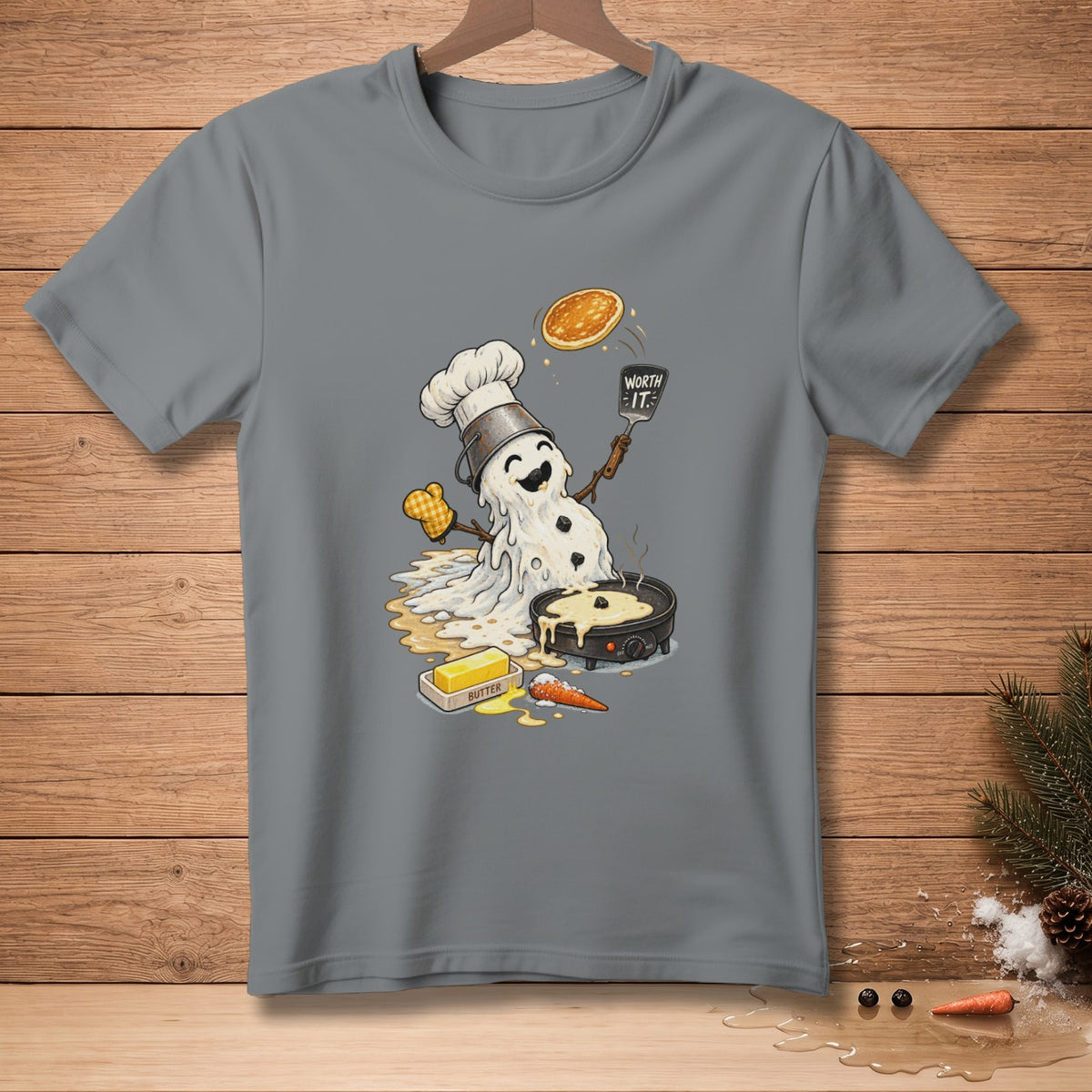 Melting snowman chef flipping pancake with "Worth It" spatula.