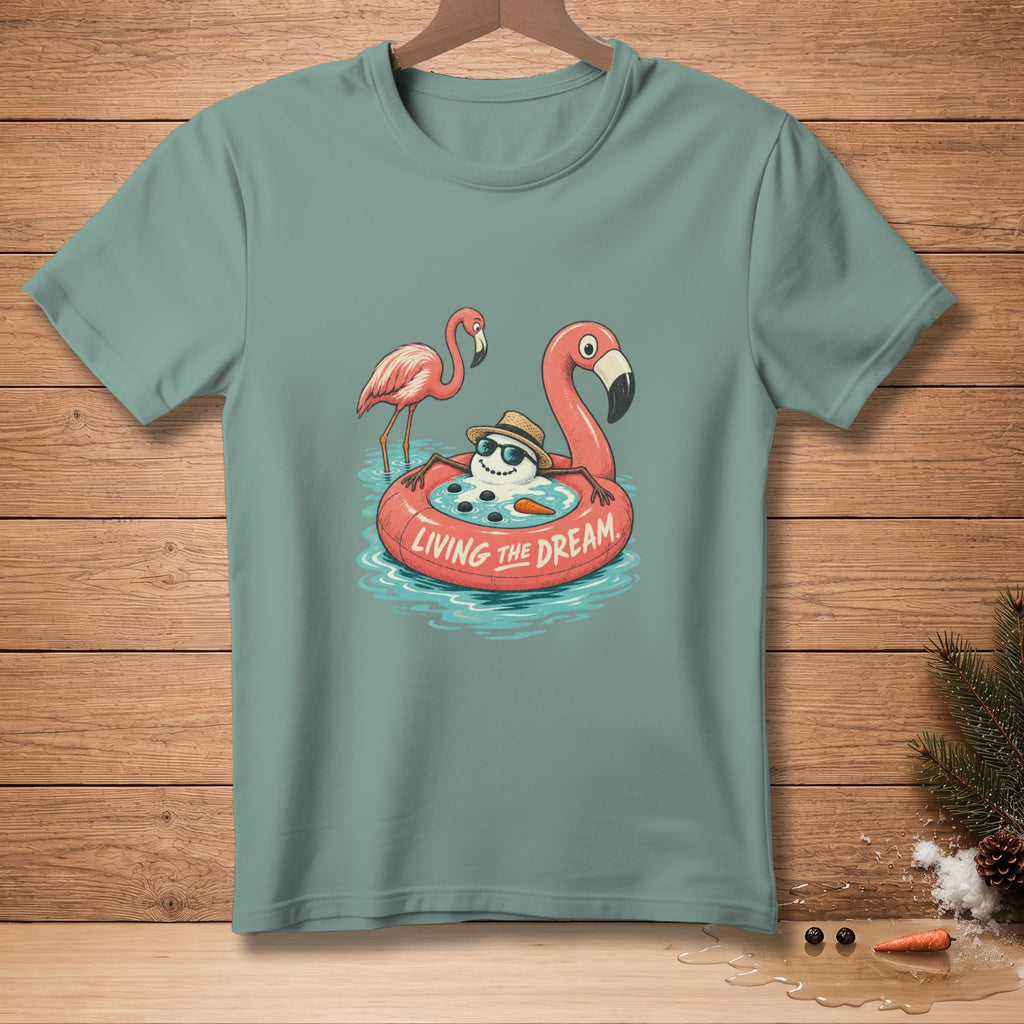 Snowman in flamingo float with two flamingos, text "LIVING THE DREAM."