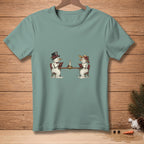 Two snowmen, one in a top hat, read books at a table by candlelight.