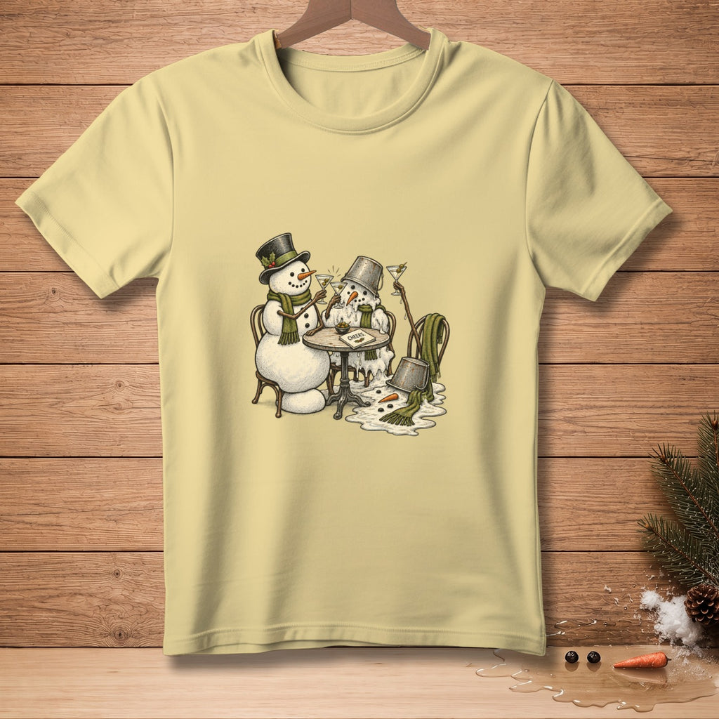 Two melting snowmen with drinks and a "Cheers" sign on a light yellow t-shirt.