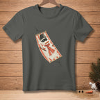 Snowman wearing a hat and scarf relaxing in a hammock on a dark grey t-shirt.