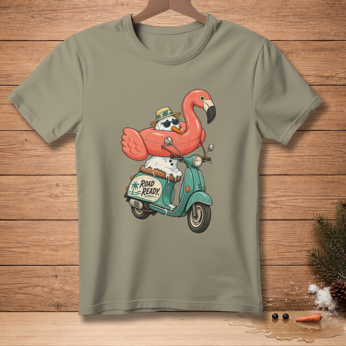 Snowman in flamingo float riding a scooter with "Road Ready" text.