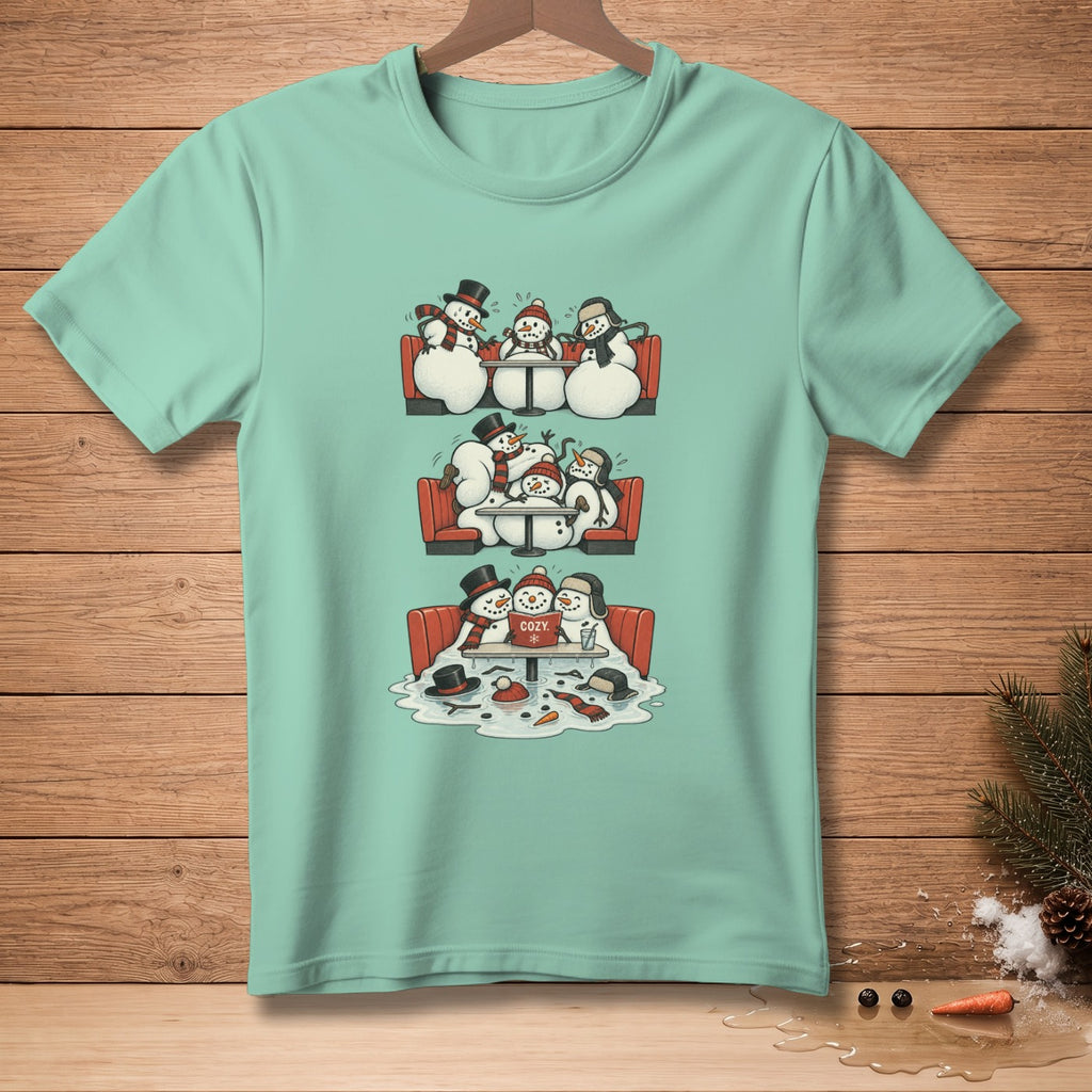 Three scenes of snowmen in booths, two with hats and scarves, one with "COZY" sign.