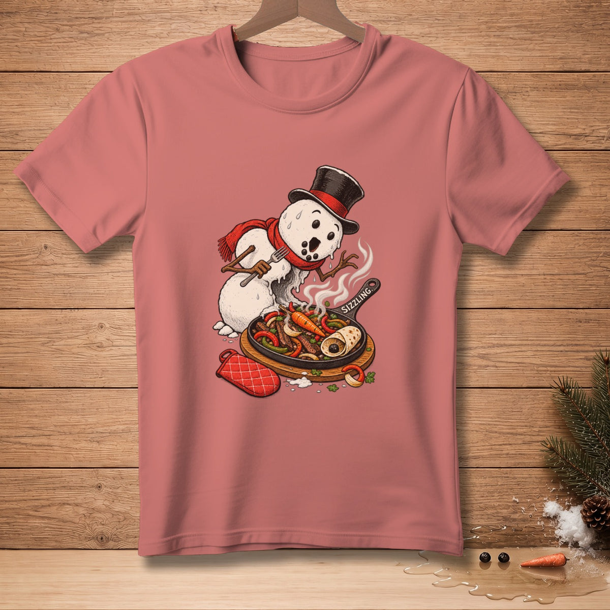 Snowman in top hat and scarf cooking sizzling fajitas on a cast iron skillet.