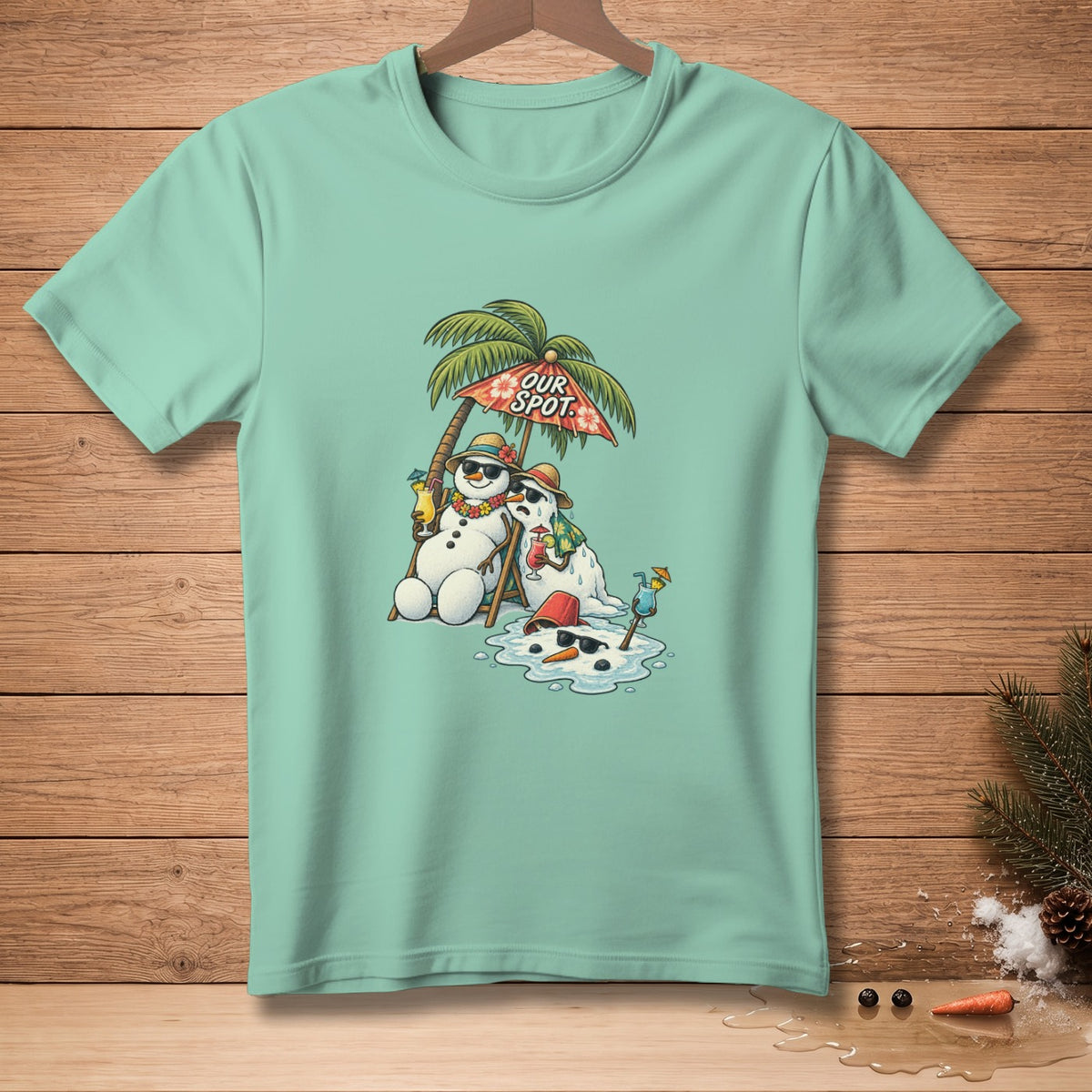 Two melting snowmen with cocktails under a palm tree umbrella that says "Our Spot."