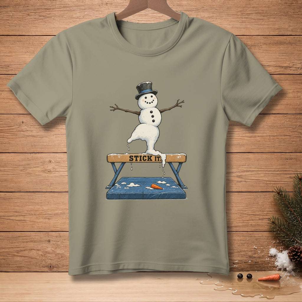Snowman in a top hat balancing on a pommel horse with "STICK IT" text.