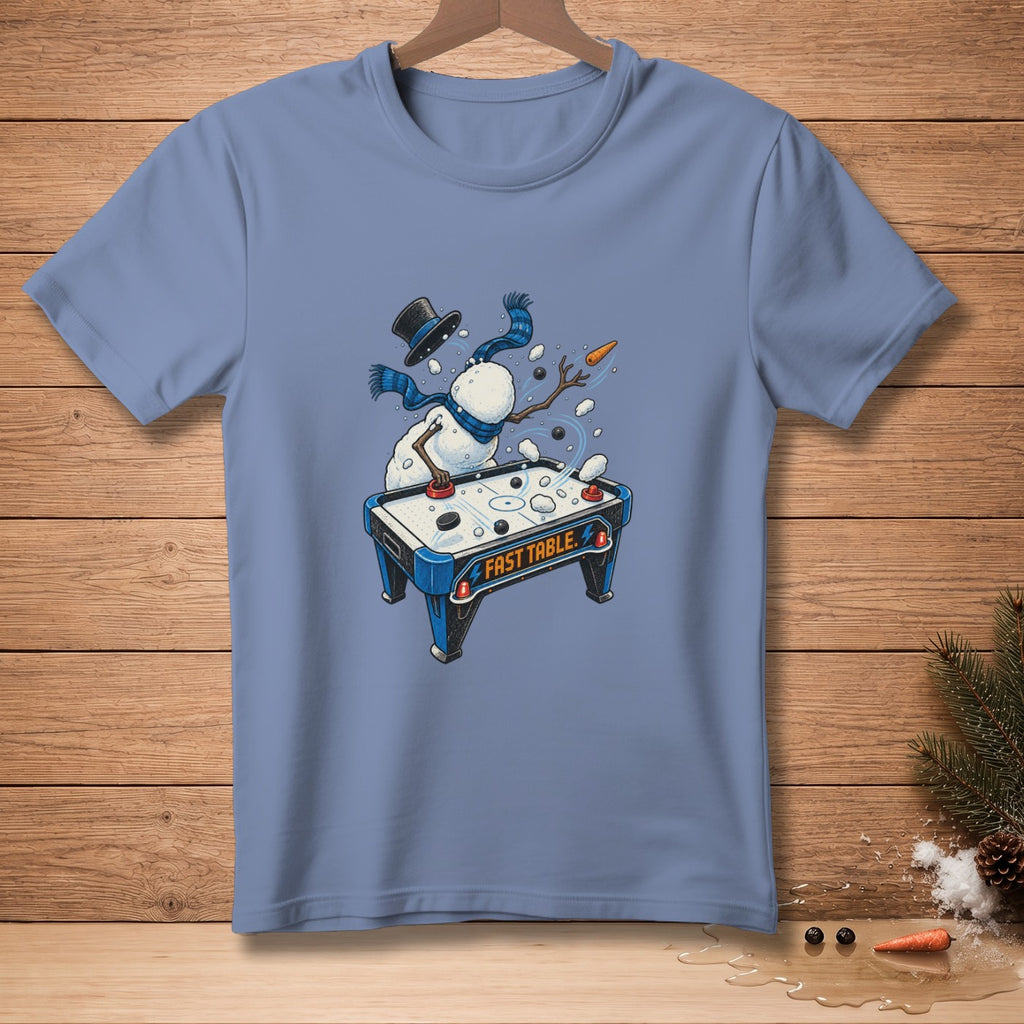 Snowman playing air hockey with text "FAST TABLE" on blue t-shirt.