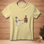 Melting snowman in hat and scarf holds "Safety Zone" sign near a pizza oven.