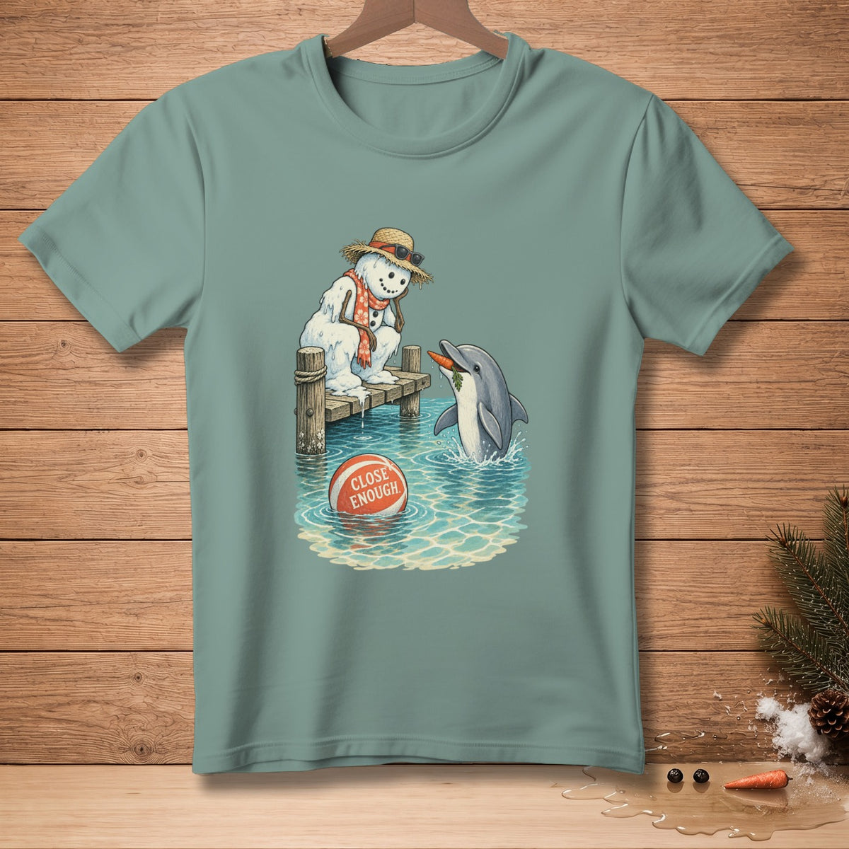 Snowman on dock feeds carrot to dolphin, with a beach ball reading "Close Enough."