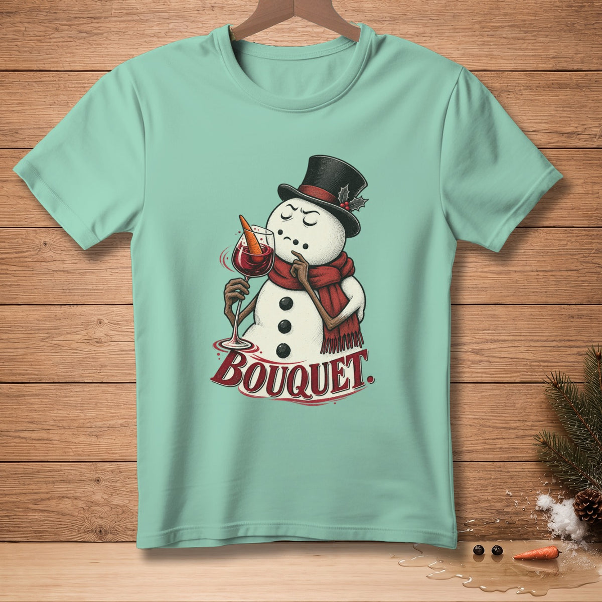 T-shirt graphic with snowman holding wine glass and text "Bouquet".