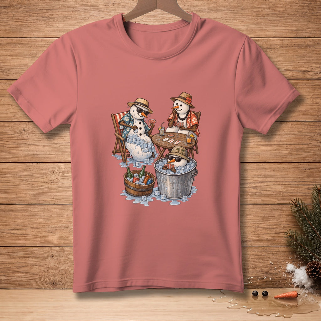 Snowmen playing cards with drinks in ice buckets on a beach.