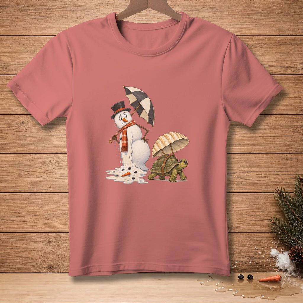 Dying snowman with umbrella beside turtle carrying umbrella on dusty rose t-shirt.