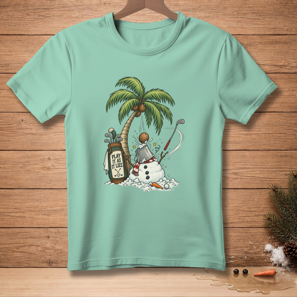Snowman with golf bag and palm tree, "PLAY IT AS IT LIES" text.