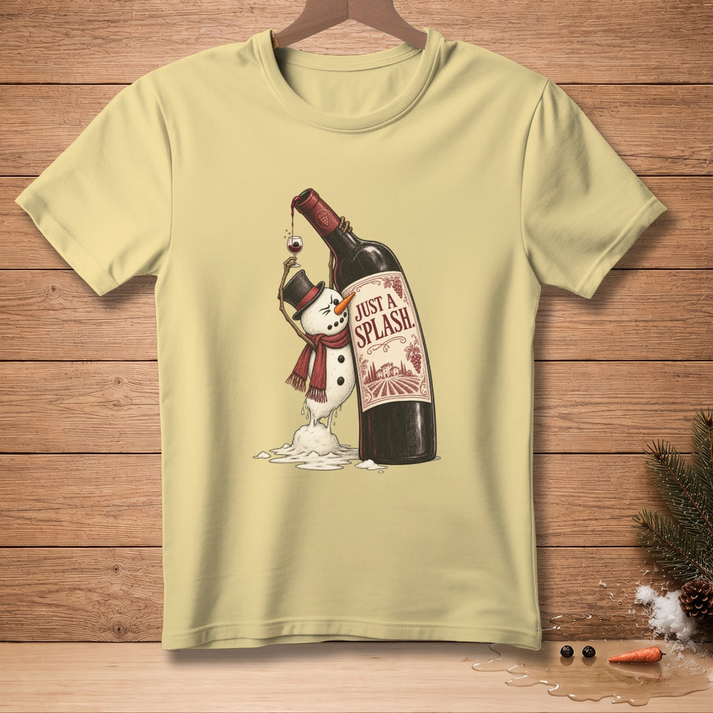 Yellow t-shirt graphic of a melting snowman holding wine with text "JUST A SPLASH."