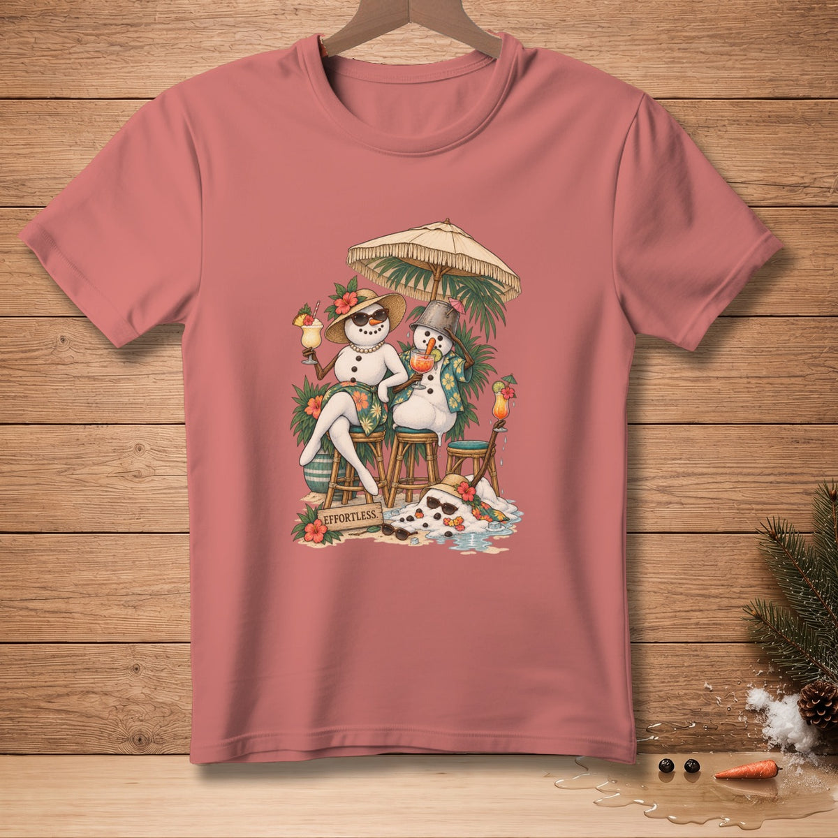 Two snowmen with drinks under an umbrella, with "EFFORTLESS" text.