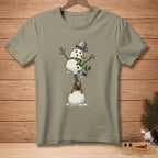 Snowman with scarf and bucket hat using leaf blower on a snowball, "MORE POWER" text.