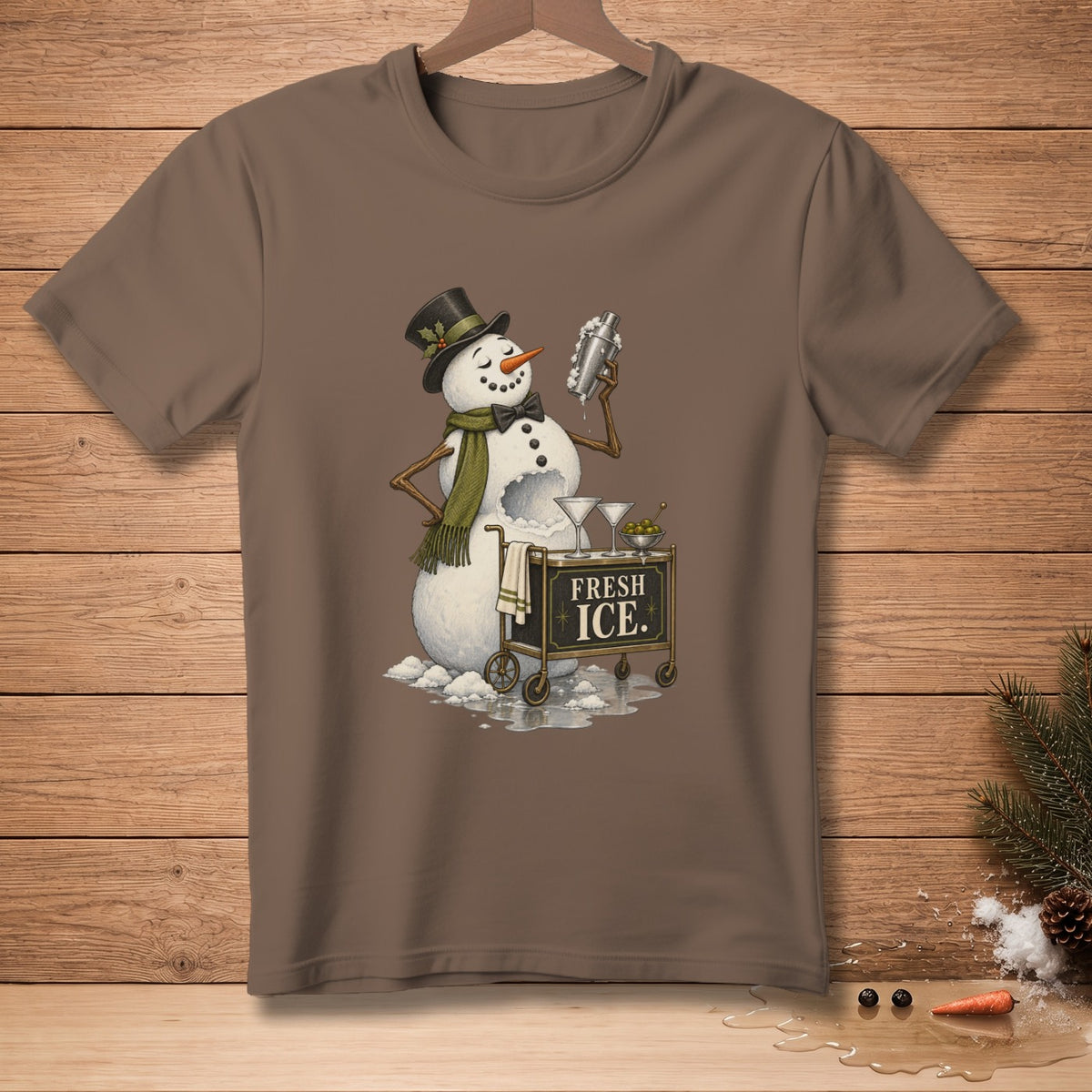 Snowman in top hat and scarf shaking cocktail shaker next to cart labeled "FRESH ICE."