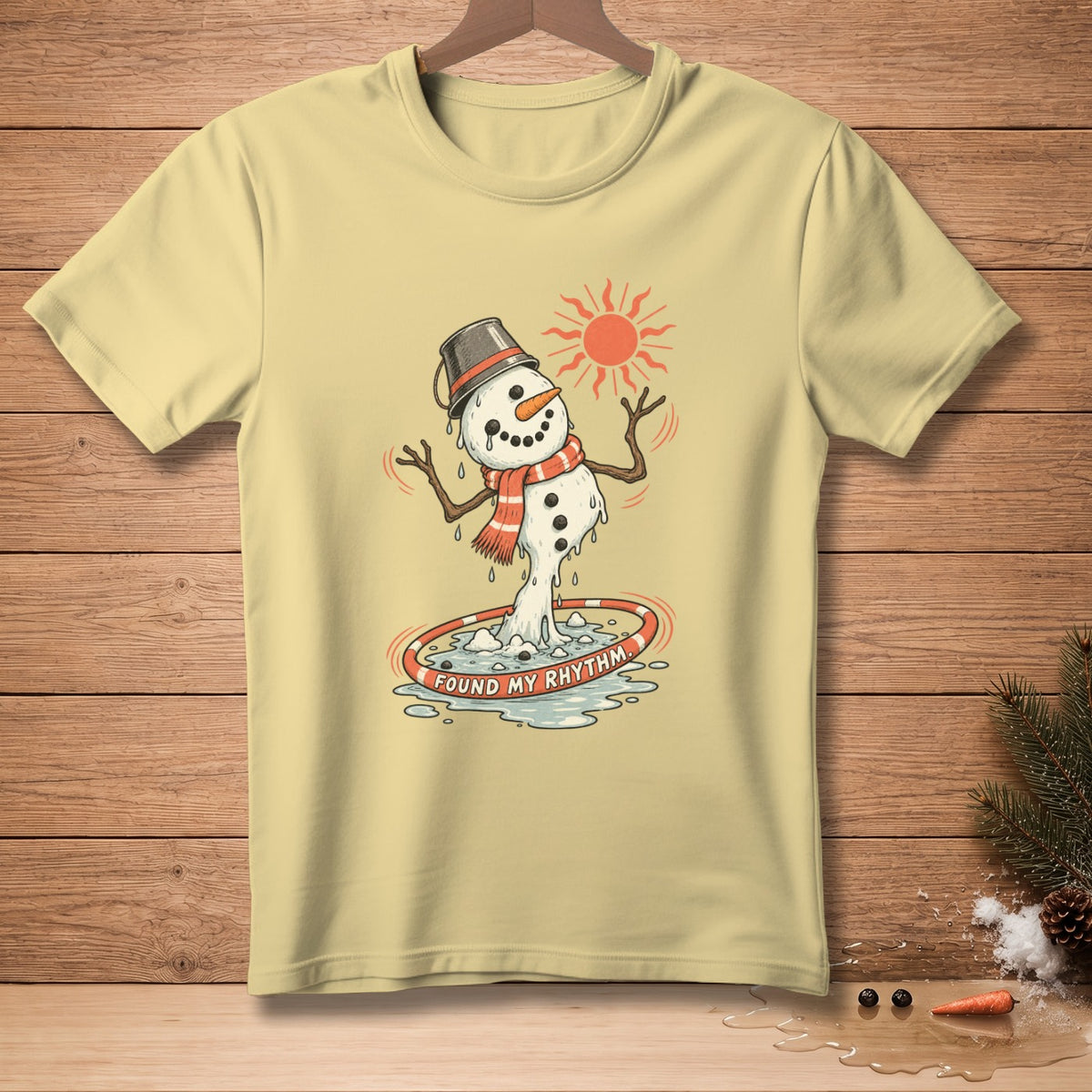 Yellow t-shirt with melting snowman graphic that says "FOUND MY RHYTHM".