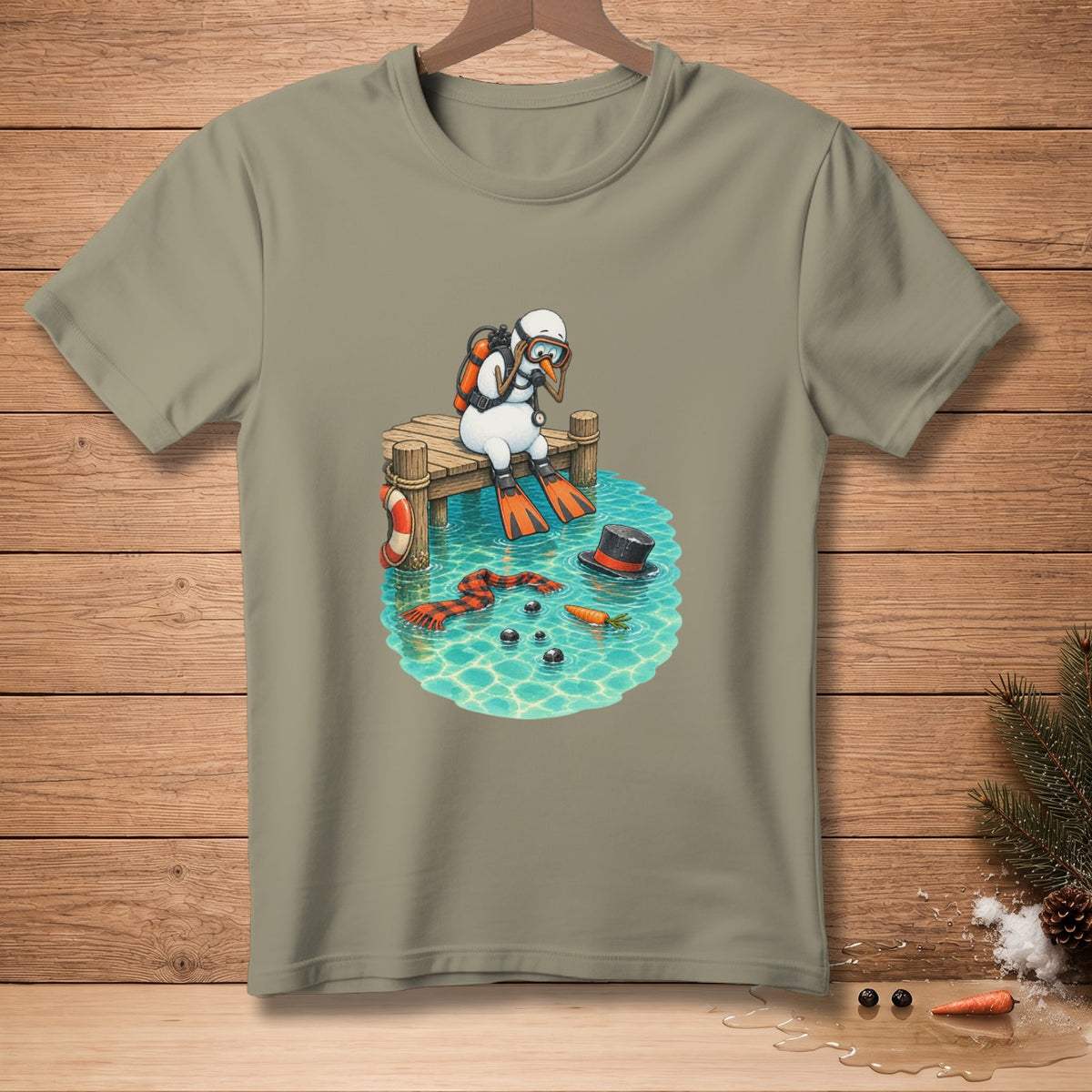 Snowman with scuba gear sits on a dock, scarf and hat floating in water.