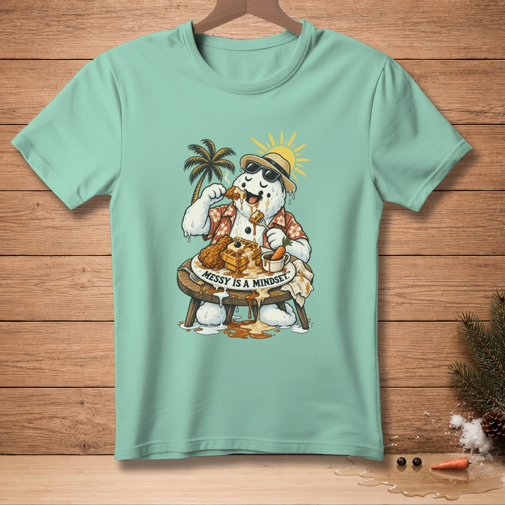Snowman wearing sunglasses and Hawaiian shirt eats waffles and fried chicken, text "Messy Is A Mindset".