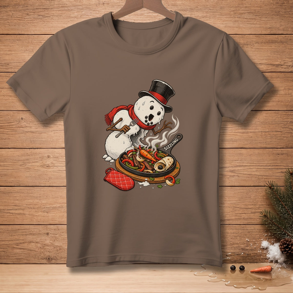 Snowman in top hat cooking sizzling fajitas with a fork on a t-shirt.