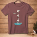 Snowman falling apart while diving into water, with "Good Luck" sign.
