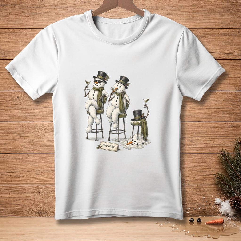 White t-shirt with illustration of two snowmen drinking martinis on bar stools.