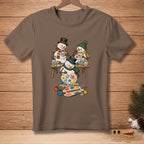 Three snowmen paint and create art on a palette with the word "Handmade".