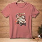 T-shirt graphic of snowmen in a golf cart with a flamingo and "NO RUSH." text.